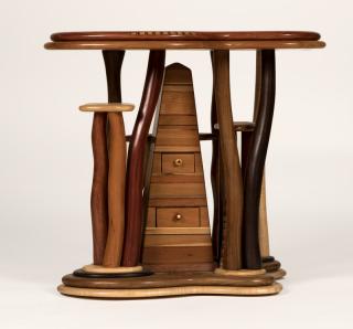 Appraisal: Steven Spiro th century hand-carved and inlaid lamp table with