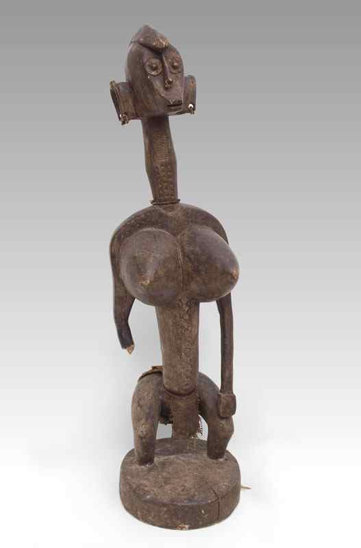 Appraisal: CARVED AFRICAN MUMUYE MATERNITY FIGURE NIGERIA ''h x ''w x