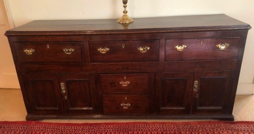 Appraisal: A George III oak dresser base with moulded top three