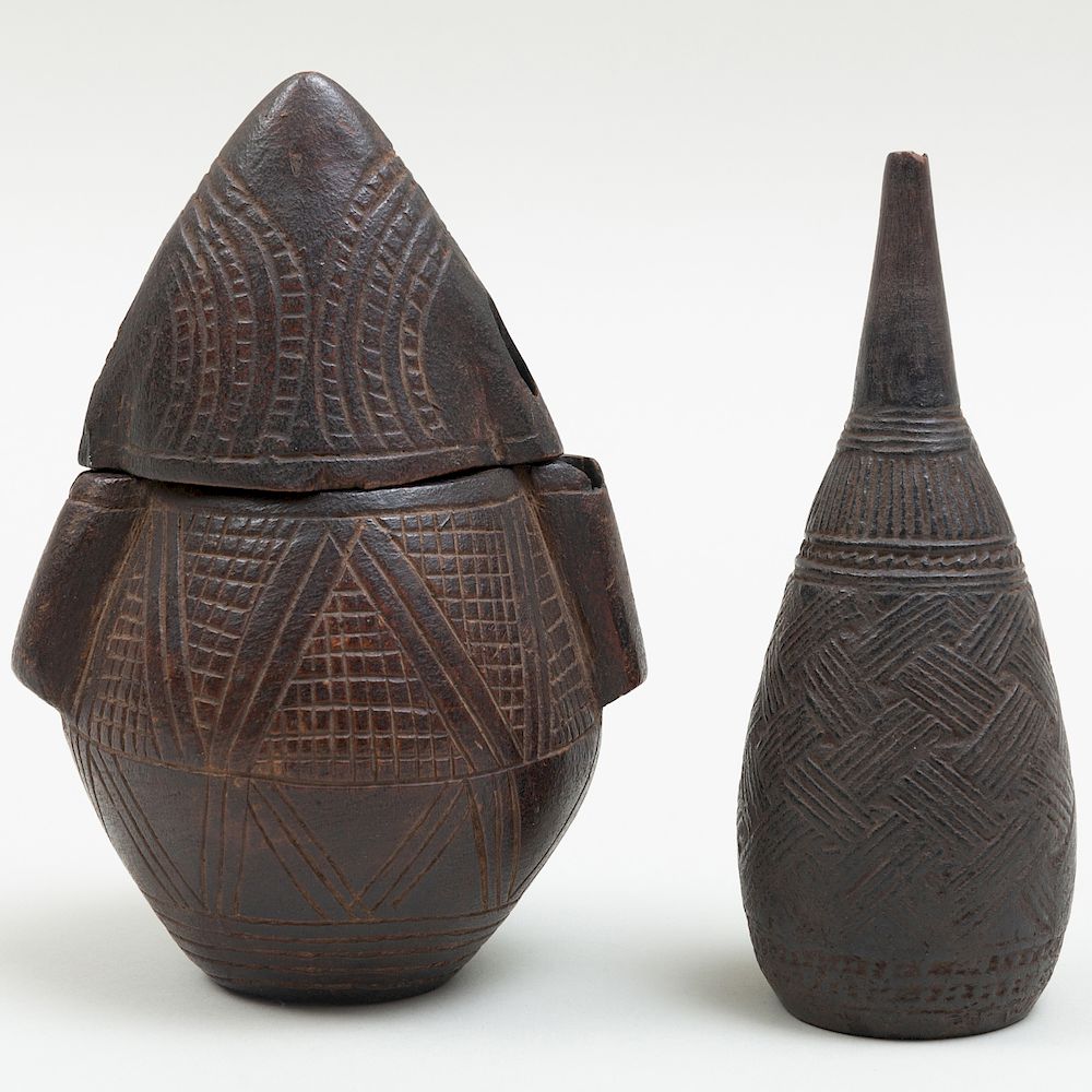 Appraisal: Zaire Carved Wood Powder Flask and an Enema Bottle Democratic