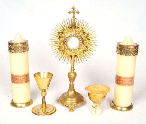 Appraisal: MONSTRANCE CHALICES COMMUNION TRAY AND ALTAR CANDLES Ornate Monstrance or