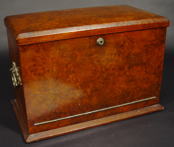 Appraisal: Walnut stationery box the hinged lid opening to reveal a