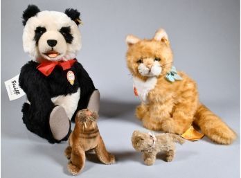 Appraisal: Four Steiff animals including one Steiff panda bear replica of