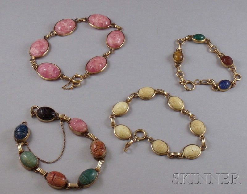 Appraisal: Four Gold-filled Hardstone and Bone Scarab Bracelets