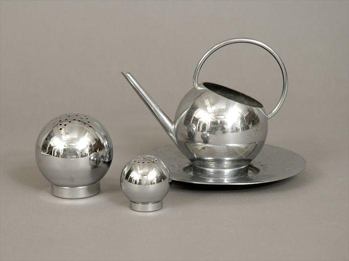 Appraisal: Russel Wright Chase Chrome Corn Set Comprising pitcher underplate and