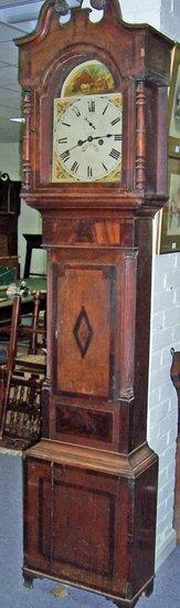 Appraisal: An oak and mahogany cased eight-day longcase clock the broken