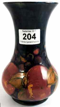 Appraisal: Moorcroft Vase decorated with Pomegranates height cm