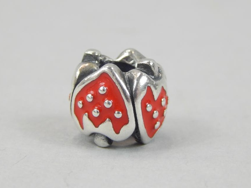 Appraisal: A Pandora strawberry charm with red enamel decoration white metal