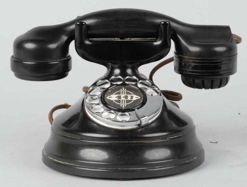 Appraisal: Automatic Electric A Telephone with Raised Base Description Circa Bakelite