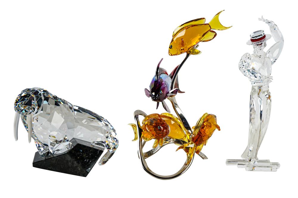 Appraisal: THREE SWAROVSKI FIGURESwith boxes the fish group inches wide inches