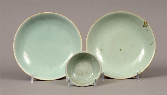 Appraisal: Two Chinese Celadon Plates Together with a small Celadon bowl