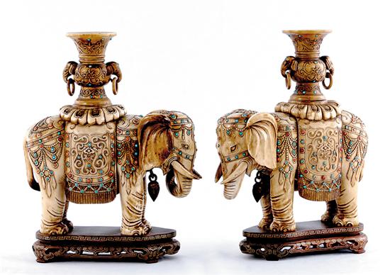 Appraisal: Pair Mideastern carved ivory elephant-form candlesticks early th century carved