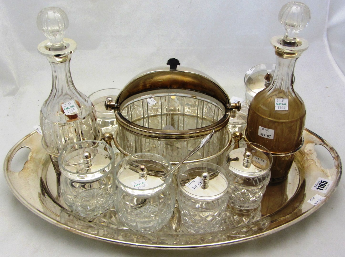 Appraisal: A silver twin handled tray stand of oval form fitted