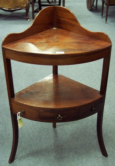 Appraisal: A Sheraton period mahogany bowfront corner washstand fitted a drawer