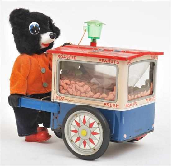 Appraisal: CRAGSTAN TINPLATE AND PLASTIC PEANUT VENDOR colourful lithographed cart with