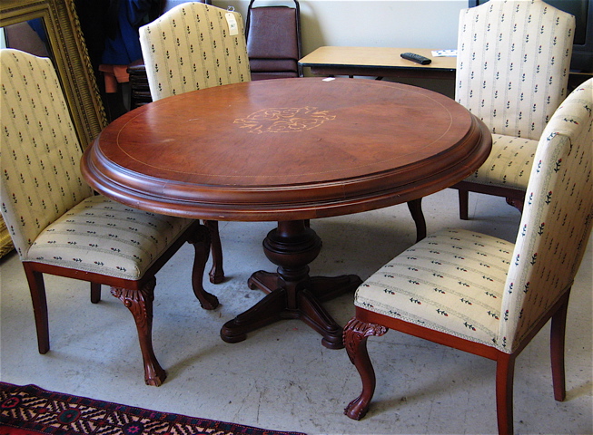 Appraisal: MAHOGANY DINING TABLE AND CHAIR SET Chippendale influence th century