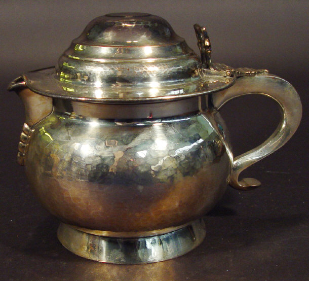 Appraisal: th century silver plated flagon the planished globular body engraved