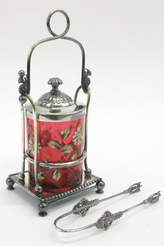 Appraisal: AN AMERICAN VICTORIAN CRANBERRY GLASS PICKLE CASTER hand enameled with