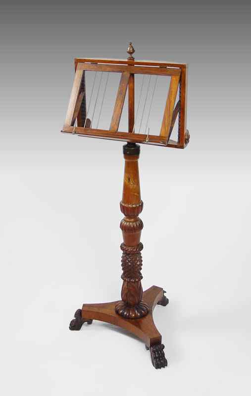 Appraisal: VICTORIAN CARVED WALNUT MUSIC STAND Carved and turned base with