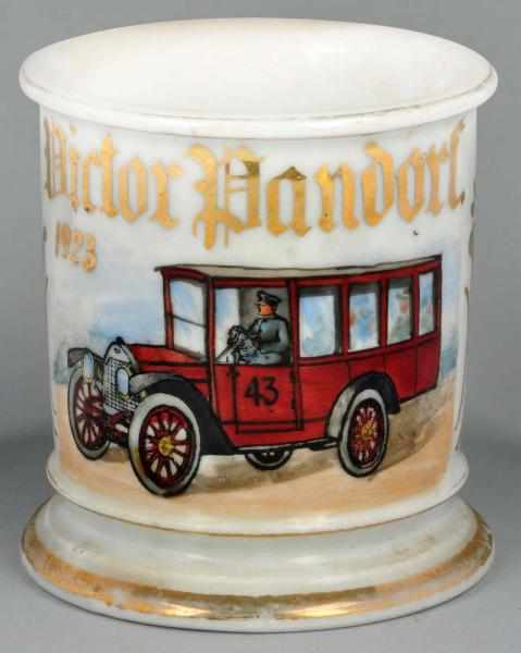 Appraisal: Red Bus Driven by Uniformed Driver Shaving Mug Description Gilt