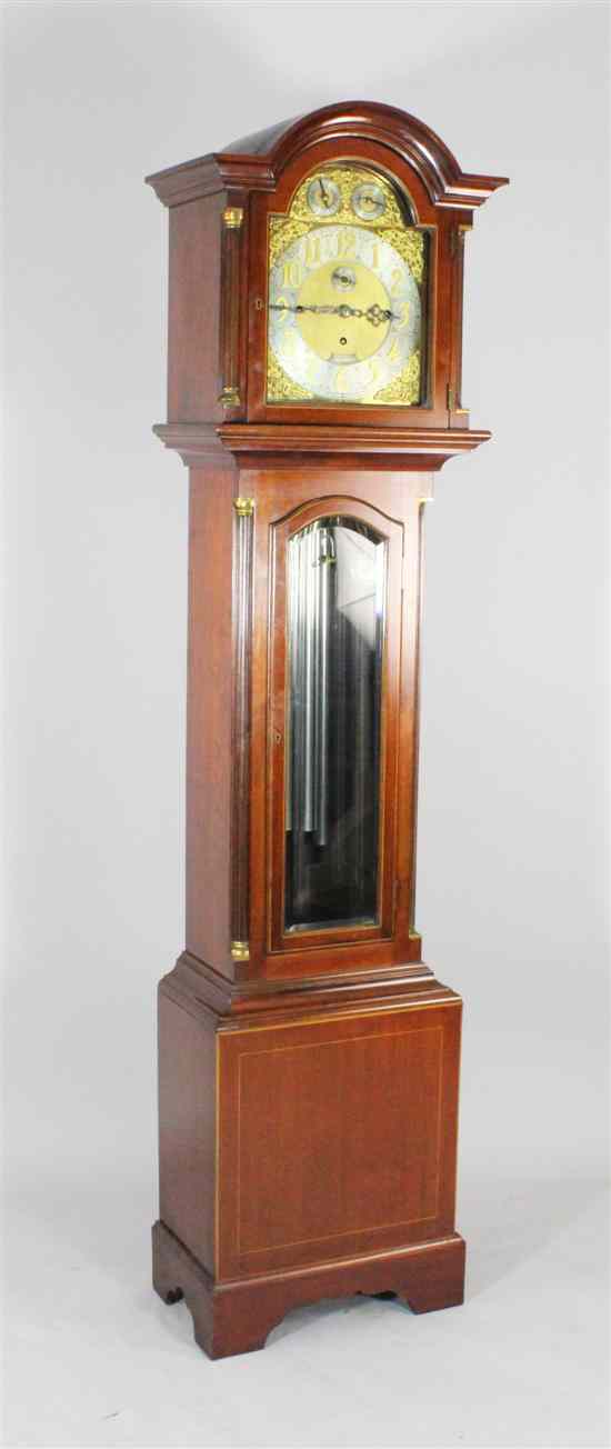 Appraisal: An Edwardian boxwood strung mahogany eight day chiming longcase clock