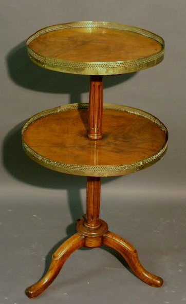 Appraisal: Two-tiered fruitwood occasional table early thc h top dia