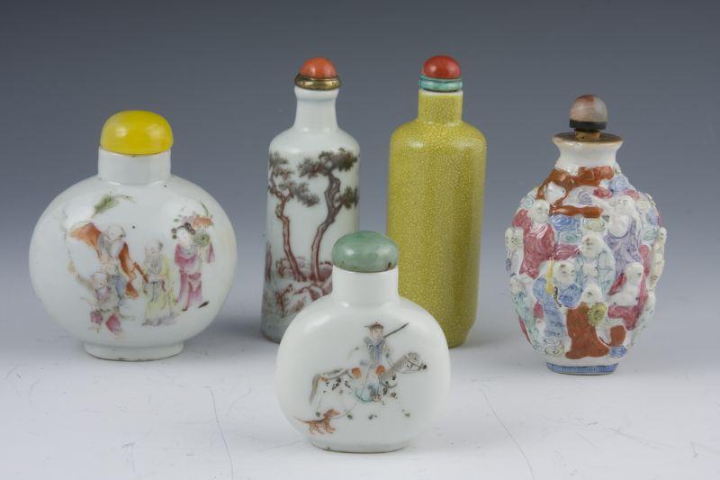 Appraisal: Five Chinese Porcelain Snuff Bottles three with hand-painted scenes against