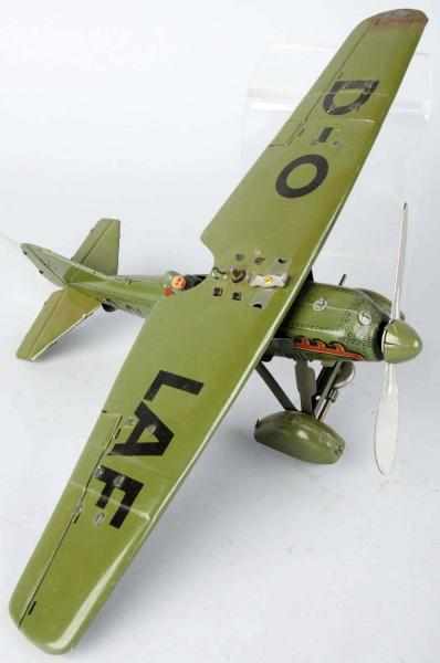 Appraisal: Tin Litho Tippco Airplane Wind-Up Toy German With swastikas on