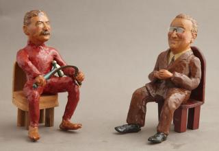 Appraisal: Pair of Unusual Folk Art Polychromed Clay Figures c of