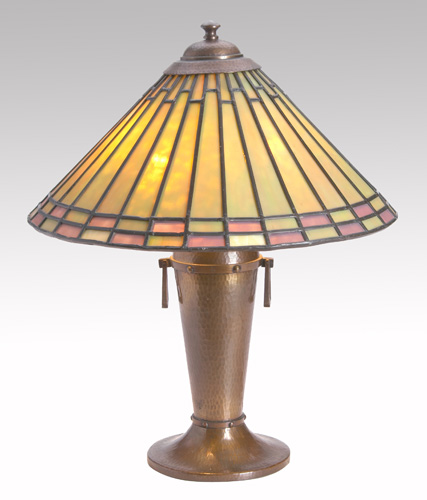 Appraisal: ROYCROFT Hammered copper and glass table lamp designed by Dard