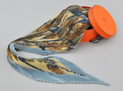 Appraisal: A Hermes Pleaded Silk Scarf in Hermes Box In light