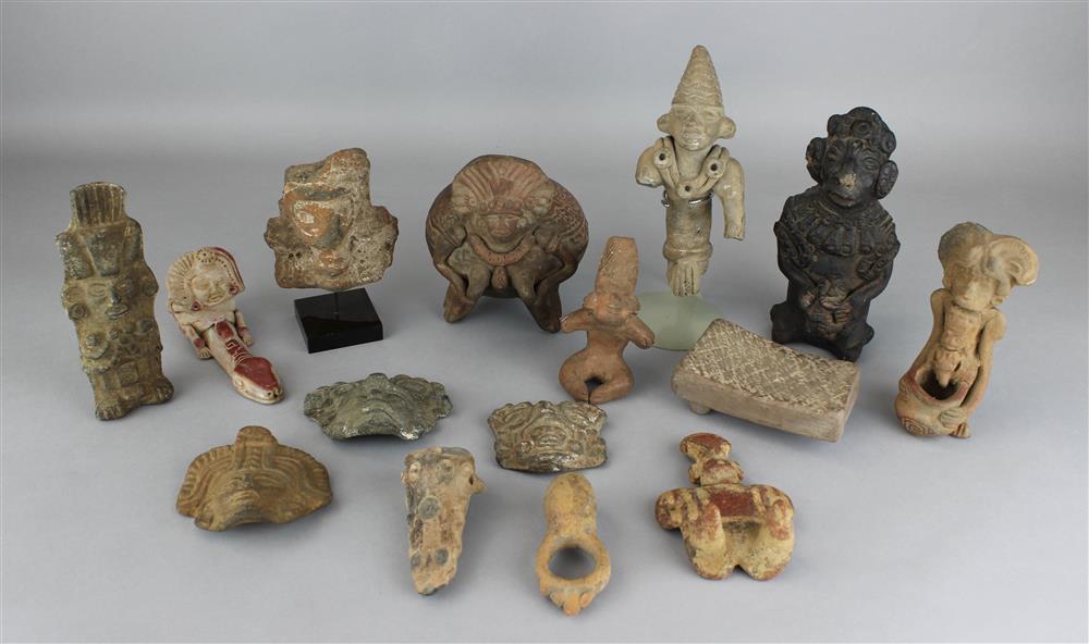 Appraisal: SOUTH AMERICAN POTTERY AND CARVED STONE FIGURAL GROUP Provenance a