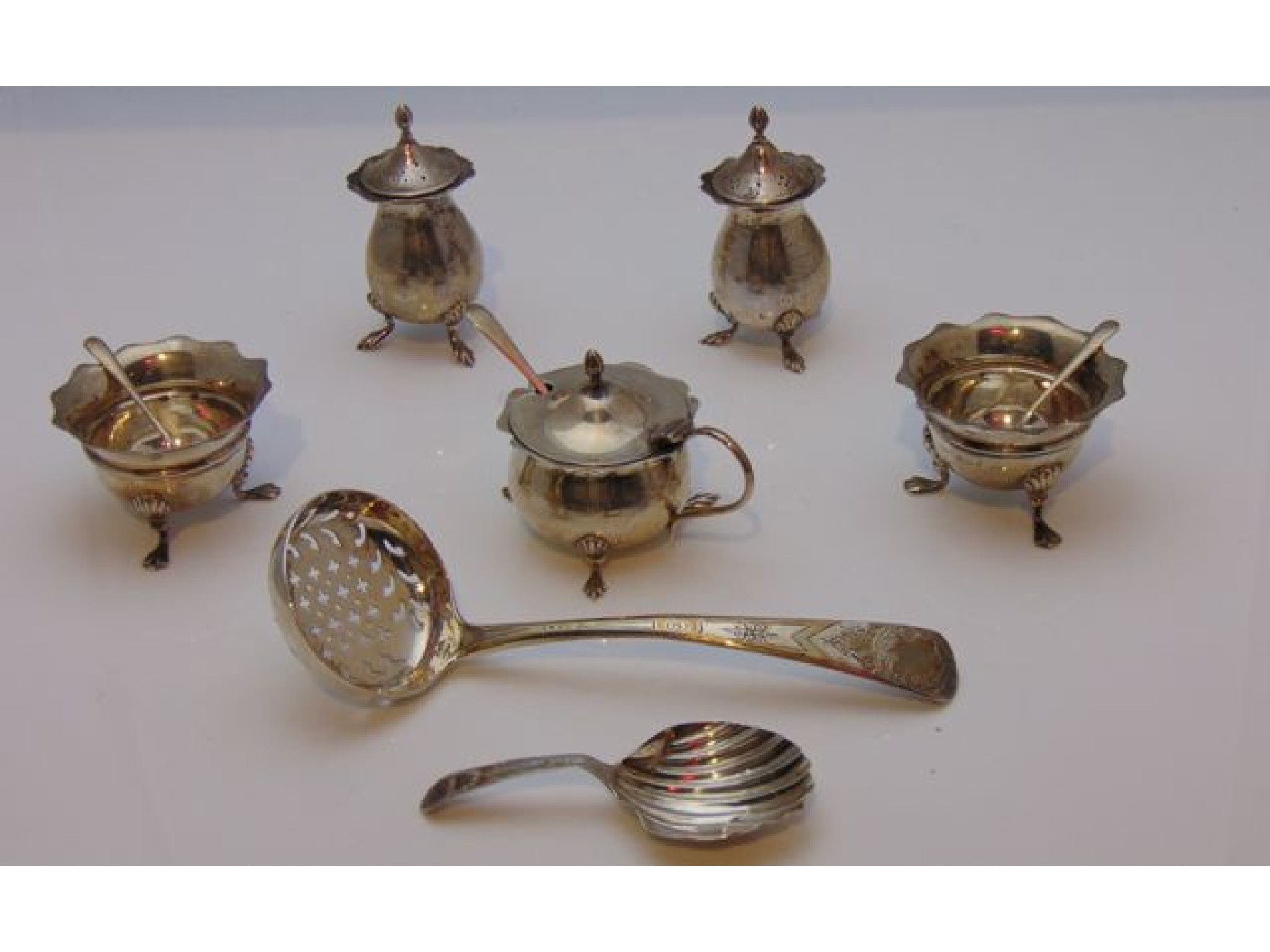 Appraisal: A George III silver Old English pattern sugar sifter spoon