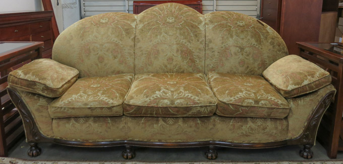 Appraisal: GOLD UPHOLSTERED AND CARVED WALNUT SOFA American c s having