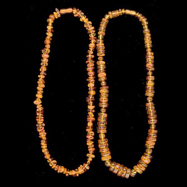 Appraisal: Amber Bead Set A duo of amber bead necklaces all