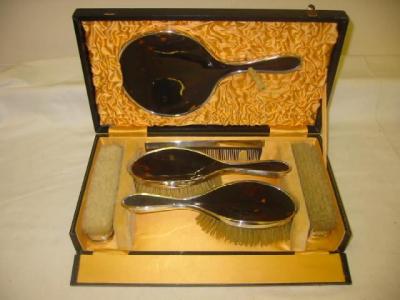 Appraisal: A SIX PIECE TORTOISESHELL BRUSH SET the concave polished backs