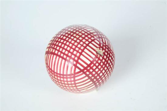 Appraisal: FOUR CARPET BALLS English nd half- th century ceramic Yellow