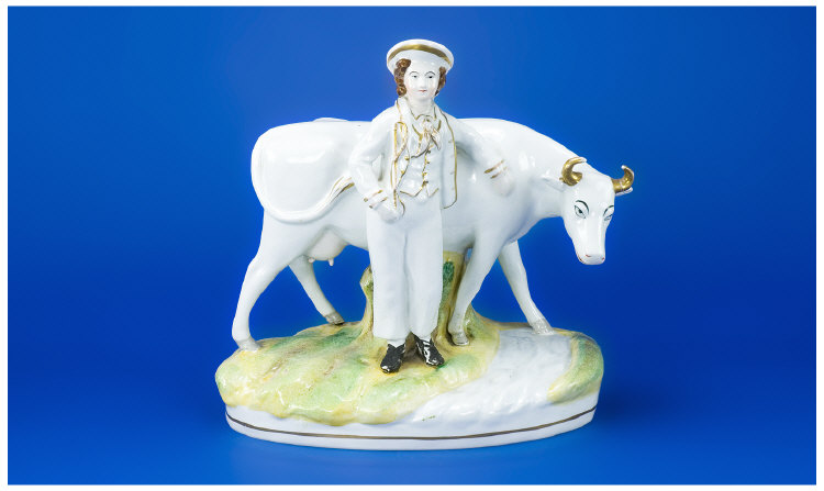 Appraisal: Staffordshire Style Figure-Group Cow and boy White and gold inches