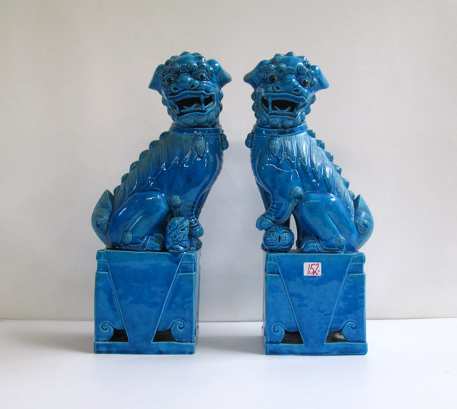 Appraisal: PAIR CHINESE CERAMIC FOO DOGS male and female raised on