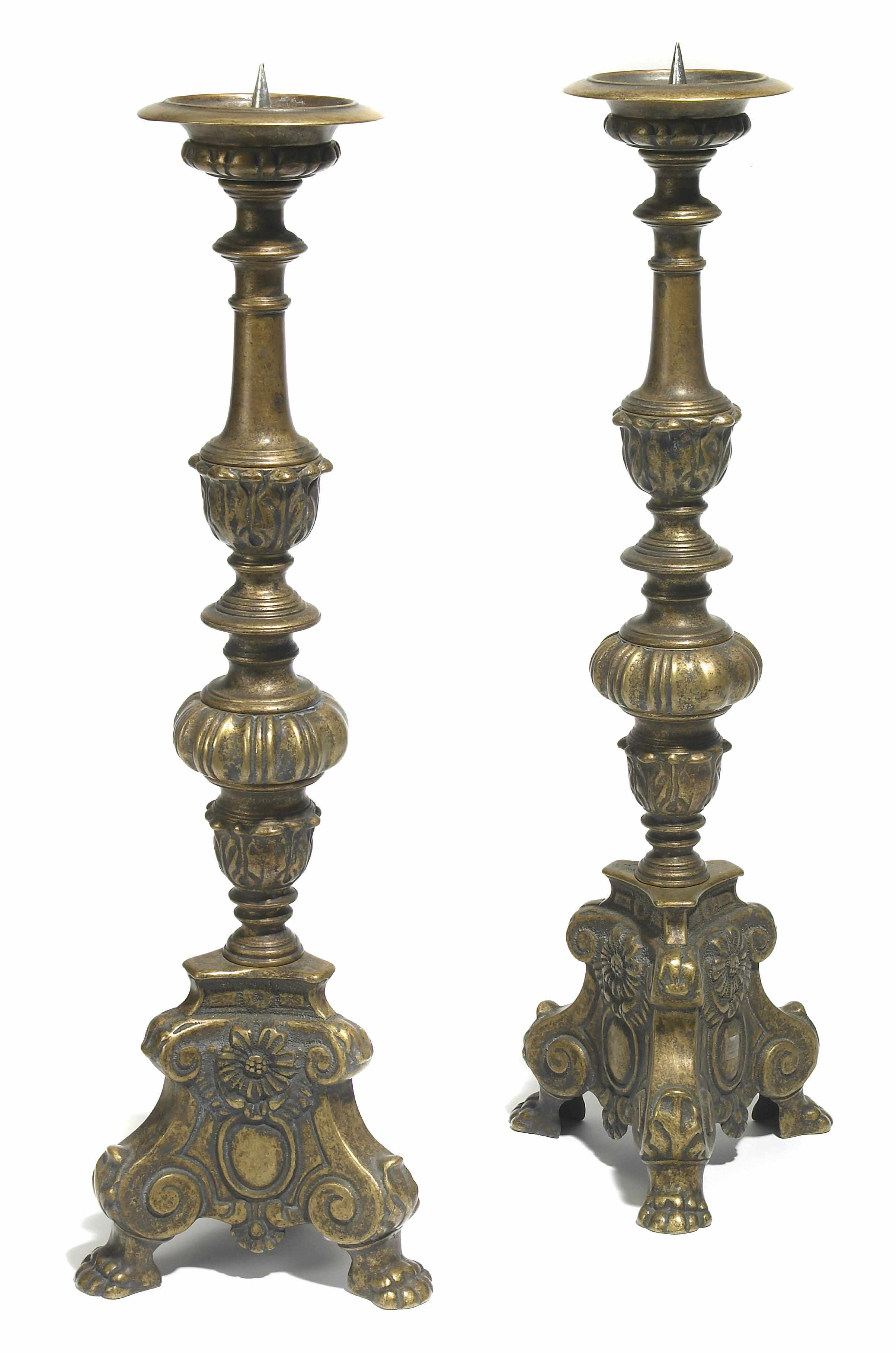 Appraisal: A pair of Baroque style bronze prickets height in cm