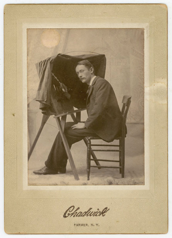 Appraisal: SELF PORTRAIT BY CHADWICK WITH CAMERA Photo on card mount