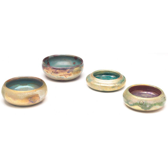 Appraisal: Pewabic bowls four hand-thrown low shapes under colorful metallic glazes