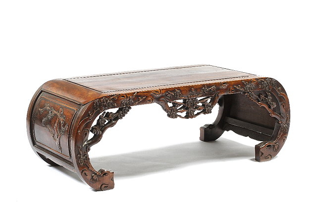 Appraisal: A Chinese hardwood Kang table th Centurywith carved blossom to