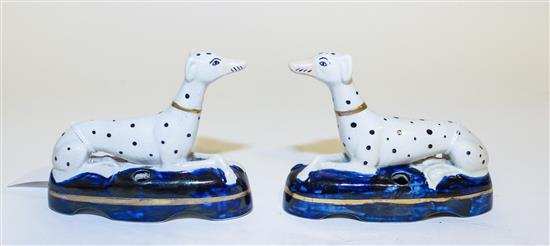 Appraisal: Sale Lot A Pair of Staffordshire Reclining Dalmation Figurines circa