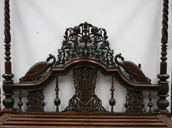 Appraisal: A lavishly carved four poster Calcutta bed head board with