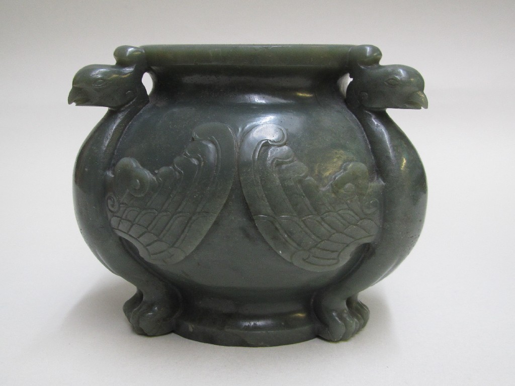 Appraisal: A Chinese green jade censor carved with three phoenix with