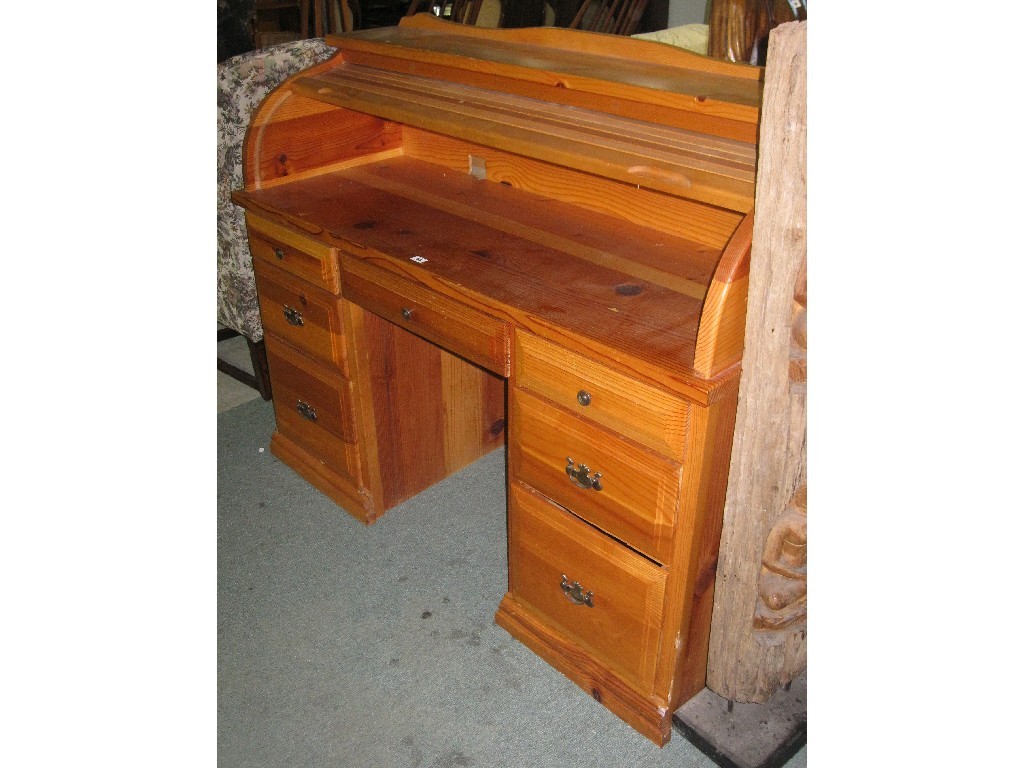 Appraisal: Pine roll top desk