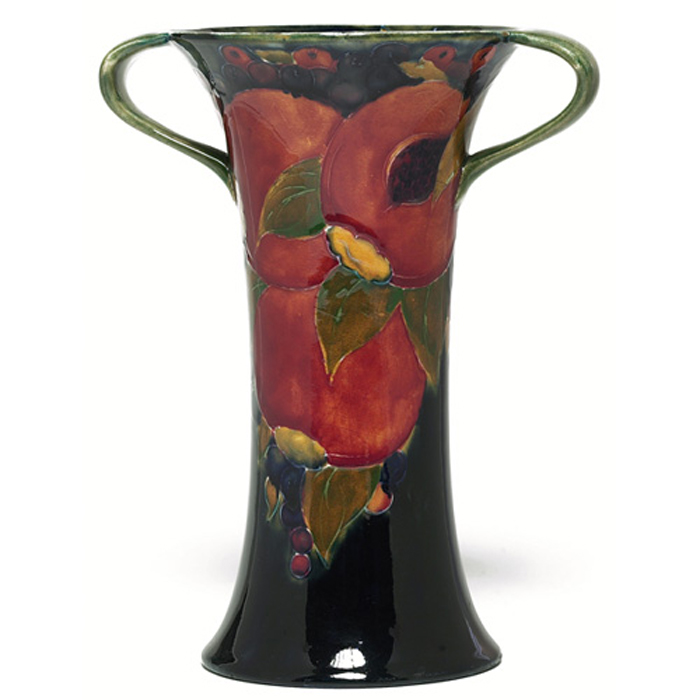 Appraisal: Moorcroft vase double handled shape with a Pomagranate decoration on