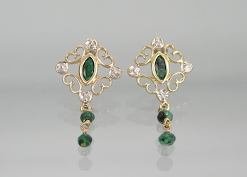 Appraisal: A Pair of Emerald and Diamond Earrings k yellow gold