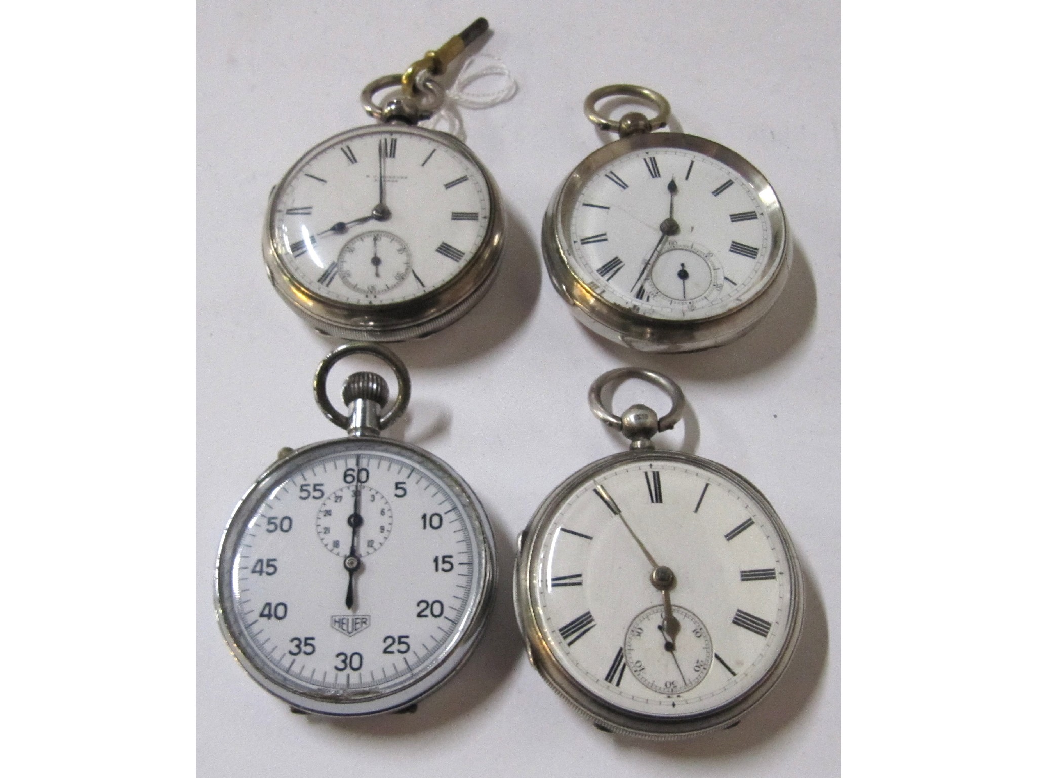 Appraisal: A lot comprising three silver cased pocket watches and a